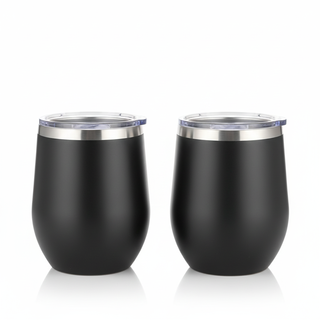 Two matte black stemless wine cups with stainless steel rims and clear lids, shown side by side on a white background.
